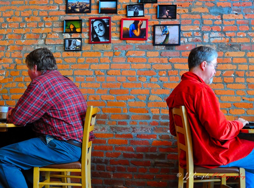 No coffeehouse chatter; people engaged with their computers